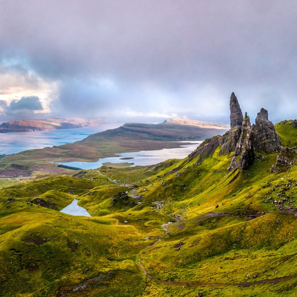 Dramatic panorama view on the rock sculpture of old man of storr located on the Isle of Skye, Scottland, Sunset with clouds