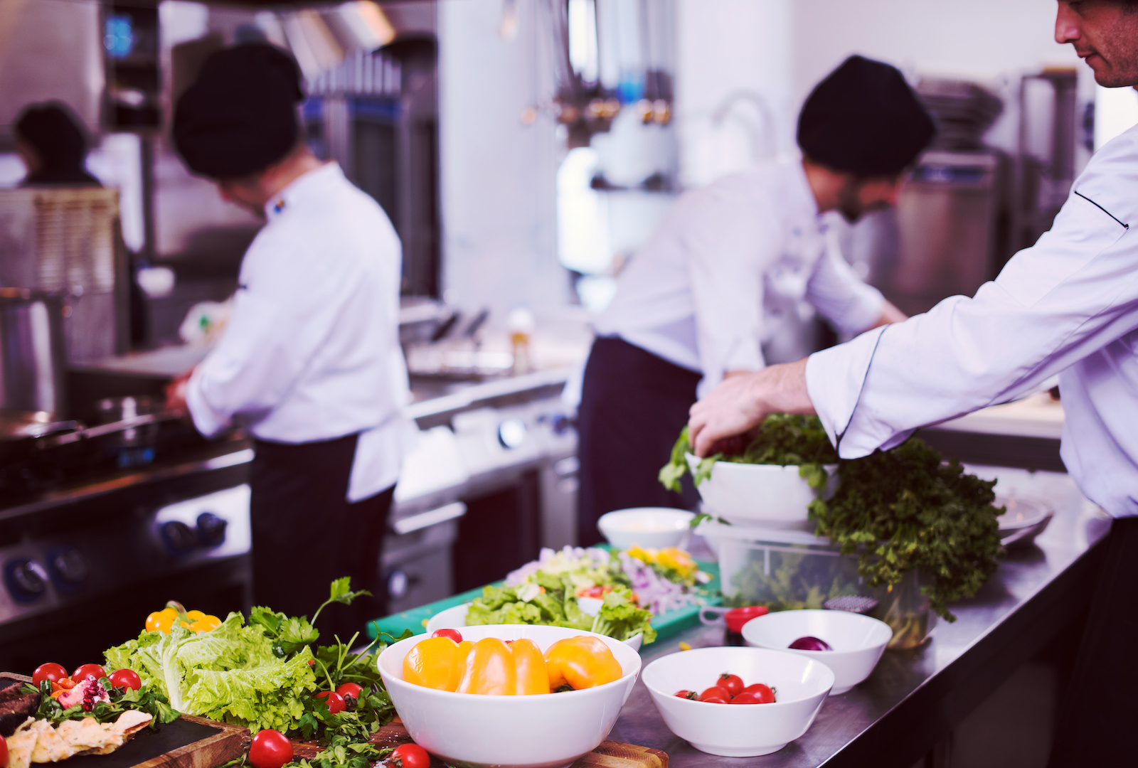 team cooks and chefs preparing meals