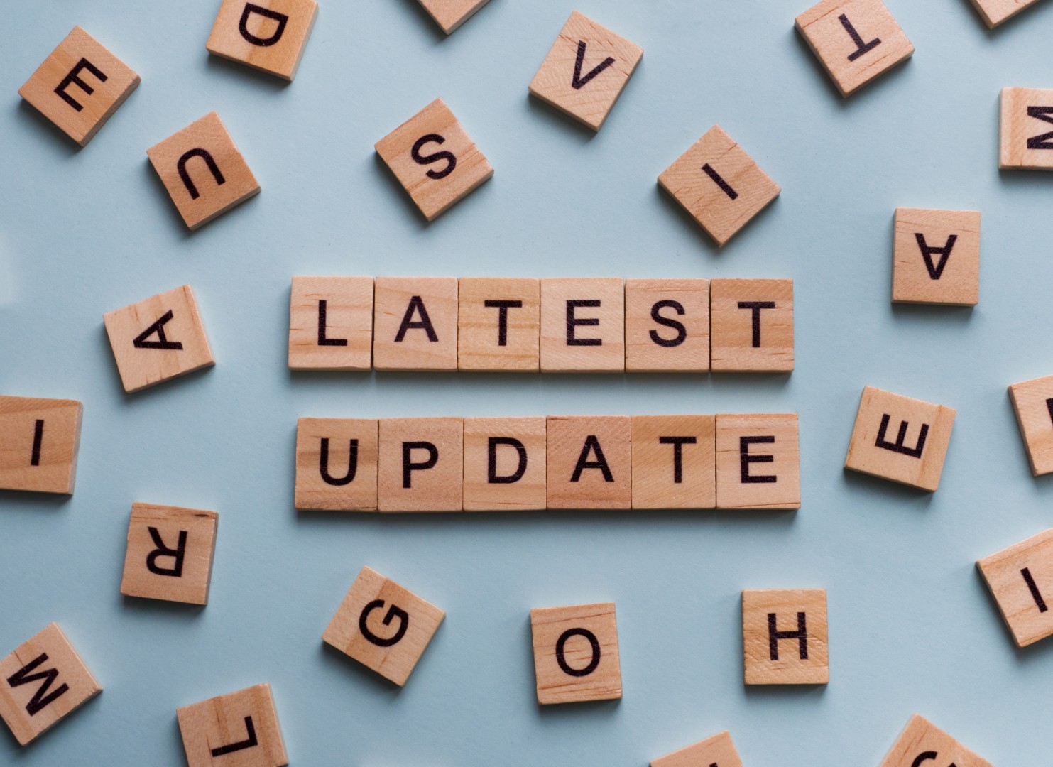 wooden-blocks-spelling-latest-update-on-blue-backg-2026-09-22-22-10-26-utc (Large)